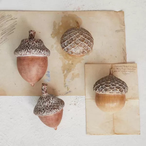 imageCreative CoOp Compact Resin Acorn Decor with Stone Powder Finish Brown