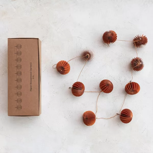 imageCreative CoOp Paper Folding Honeycomb Pumpkin Garland with Twig Stems in Kraft Box Orange Color