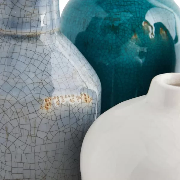 imageCreative CoOp Stoneware Bud Vases in Crackle Glaze GreyMustard Tones Set of 4WhiteBlues