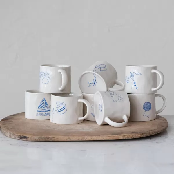 imageCreative CoOp Stoneware Wax Relief Illustration and Secret Image on Bottom Cream and Blue Set of 8 Styles Mugs Multi