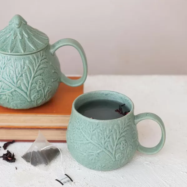 imageCreative CoOp 16 oz Embossed Stoneware Mug with Botanicals and Reactive Glaze Sage