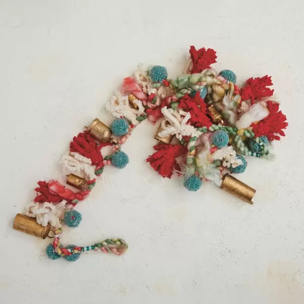 imageCreative CoOp Handmade Wool and Cotton Blend Garland with Pom Poms and Metal Bells Multicolor and Antique Gold Finish