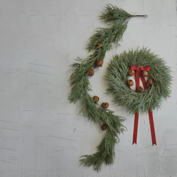imageCreative CoOp Round Faux Wreath with Red Ribbon and Rust Finish Metal Bells