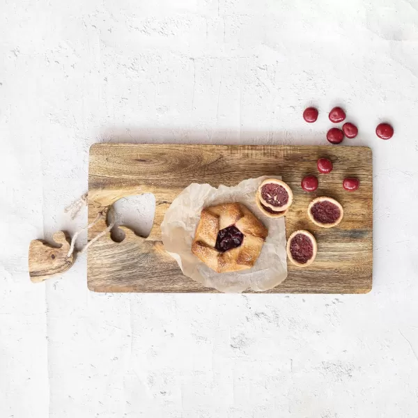 imageCreative CoOp Mango Wood Cheese and Cutting Board with Santa Hat CutOut Natural