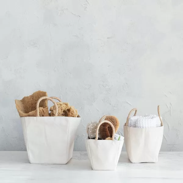 imageCreative CoOp Natural Cotton Canvas Containers with Braided Handles Set of 3 Large Medium Small