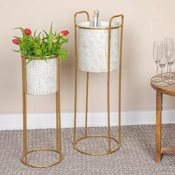 imageCreative CoOp Tall Metal Planter on Stand Cream and Gold