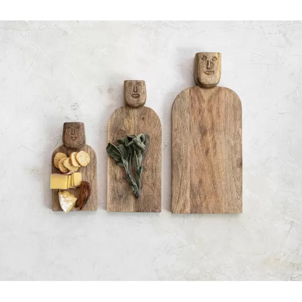 imageCreative CoOp Large HandCarved Mango Wood Slicer Face Handle Design and Combed Finish Natural Cheese and Cutting Board