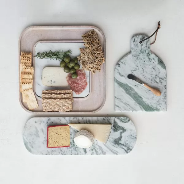 imageCreative CoOp Marble and Wood Cutting Board on a Dish White
