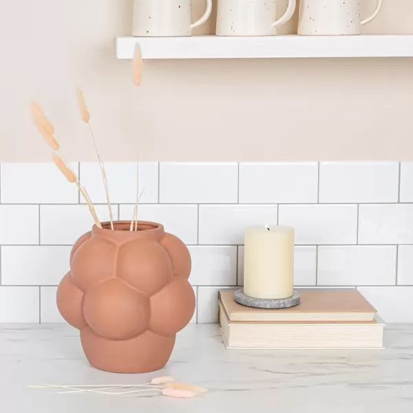 imageCreative CoOp Bulbous Stoneware Vase with Raised Dots and Matte Finish WhiteTerracotta