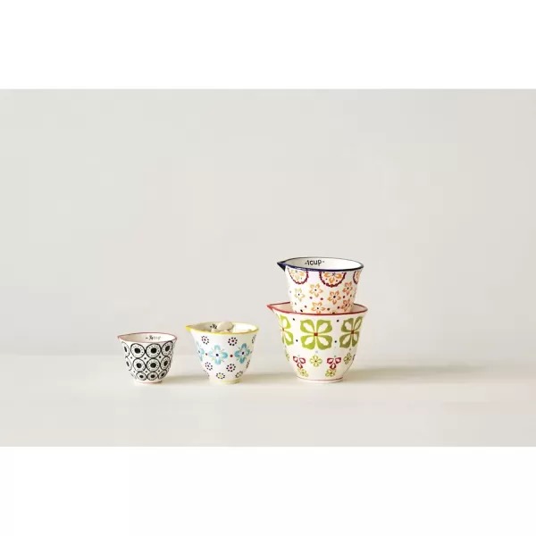 imageCreative CoOp Floral Hand Stamped Stoneware Measuring Cups Set of 4 SizesDesigns