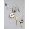 imageCreative CoOp Brass Printed Drawstring Bag Cake Server 11quot L x 3quot W x 0quot H