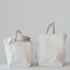 imageCreative CoOp Natural Cotton Canvas Tote Bags with Braided Handles Set of 2 Large Medium