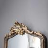 imageCreative CoOp Distressed Resin Framed Wall Mirror Black and Gold