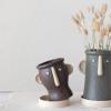 imageCreative CoOp Stoneware Face Planter with Saucer Set of 2 Matte Black and Cream 9quot7