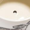 imageCreative CoOp 65 Inches Round Stoneware Planter with Rabbit Design and Scalloped Saucer Holds 5 Inches Pot White and Charcoal Set of 2