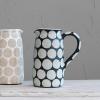 imageCreative CoOp Decorative Terracotta Wax Relief Dots Black and Natural Pitcher