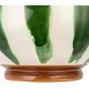 imageCreative CoOp 1025 Inches Round HandPainted Stoneware Footed Stripes and Reactive Glaze Green White and Brown Bowl Multi
