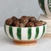imageCreative CoOp 1025 Inches Round HandPainted Stoneware Footed Stripes and Reactive Glaze Green White and Brown Bowl Multi