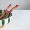 imageCreative CoOp 12 Inches Teakwood Kitchen Salad Servers with Rattan Wrapped Handles and Drawstring Bag Multicolored Set of 2