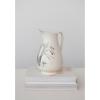 imageCreative CoOp 65 Inches 2Quart Stoneware Flower Design White and Charcoal Pitcher