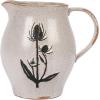 imageCreative CoOp 675 Inches 50Ounce Debossed Stoneware Flower Design Reactive Glaze White and Black Pitcher