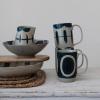 imageCreative CoOp Stoneware Painted Designs Set of 3 Styles Black and Tan Mug Blue