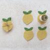 imageCreative CoOp 4Piece Handmade Beaded Lemon Coasters with Jute Tie Yellow and Green