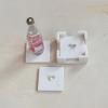 imageCreative CoOp Marble Coasters with Heart Shaped Mother of Pearl Inlay White and Natural