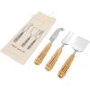imageCreative CoOp Stainless Steel Charcuterie Knives with Rattan Wrapped Handles Set of 3 Styles