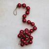 imageCreative CoOp Glass Ball Ornament Garland on Jute String Red