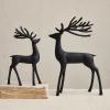 imageCreative CoOp Resin Reindeer Decor Black75 L x 25 W x 12 H