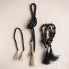 imageCreative CoOp Paulownia Wood Bead Garland with Jute Tassels Distressed Black