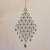 imageCreative CoOp Hanging Metal Hearts Wall Decor with Bells Gold and Black