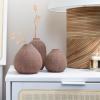 imageCreative CoOp White Stoneware Vases with Textured Black Polka Dots Set of 3 SizesBrown