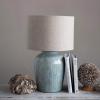 imageCreative CoOp DF4157 Coastal Aqua Blue Ceramic Stoneware Table Lamp with Natural Ivory Linen Shade Reactive Glaze Finish