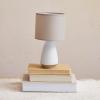 imageCreative CoOp Stoneware Matte Table Lamp with Linen Shade and Speckled Finish White