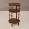 imageCreative CoOp 3Tier Curved Accent Table with Beveled Shelves and Doweled Legs Matte Black FinishWalnut Color