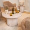 imageCreative CoOp Round Mango Wood Pedestal Coffee Table with Ribbed Base Stained BlackNatural
