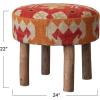 imageCreative CoOp Round Cotton and Wool Kilim Stool with Wood Legs Natural and Orange