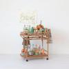 imageCreative CoOp HandWoven Rattan 2Tier Bar Cart on Wheels Natural