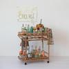 imageCreative CoOp HandWoven Rattan 2Tier Bar Cart on Wheels Natural