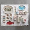 imageCreative CoOp Coastal Stoneware Pitcher with Wax Relief Lobster Illustration Multicolor