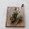 imageCreative CoOp Mango Wood CheeseCutting Board with Leather Handle Natural