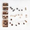imageCreative CoOp Decorative Paper Folding Honeycomb Ornaments with DIY Garland String Brown Set of 12
