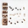imageCreative CoOp Decorative Paper Folding Honeycomb Ornaments with DIY Garland String Grey Color Set of 12