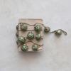 imageCreative CoOp Embossed Mercury Glass Ball Ornament Garland with Jute Cord Olive Green