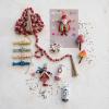 imageCreative CoOp Paulownia Wood Bead Garland with Jute Tassels Pink and Red