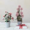 imageCreative CoOp Metal Flower Pot Decor with Faux Flowers Pink and Green