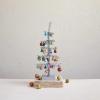 imageCreative CoOp Tinsel Tree with Glass Ornaments and Wood Base Silver