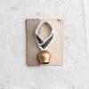 imageCreative CoOp Metal Cowbell with Cotton Patterned Hanger Gold Finish